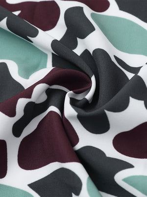 Fabric close-up of Stylish printing summer shirt with lightweight feel in brown green camo