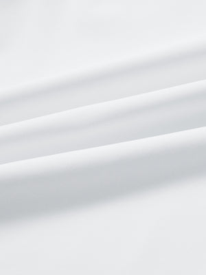 Close-up fabric detail of lightweight golf quarter zip pullover, smooth texture and breathable feel in [white navy stripe