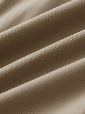 Material detail of Water resistant everyday pants showing smooth finish in khaki