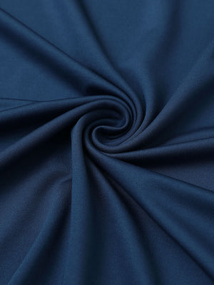 Close-up of fabric on everyday jersey henley shirt, soft knit texture with relaxed blue tone