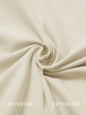 Close-up of inside and outside fabric of lightweight casual fleece jacket with 5 pockets in light khaki.
