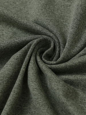Fabric close-up of quarter zip hoodie with kangaroo pocket, soft texture and cozy feel in olive green heather