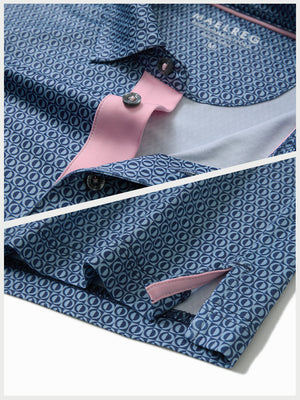 Hem detail of Performance quick dry print golf polos with neat stitching and light blue navy circles finish