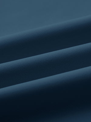 Close-up of fabric on water repellent 8 pockets pants, showing texture and finish in blue indigo.