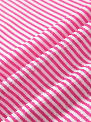 Close-up of rose stripe performance cooling polo - youth fabric texture.