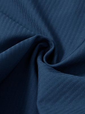 Close-up of fabric on lightweight flat front casual trousers, highlighting texture and finish in blue indigo.