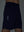 Detail of glow in the dark feature on navy  breathable running shorts with 4 zipper pockets