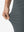 Detail view of stretch fabric on dark gray women's regular fit stretchy golf pants