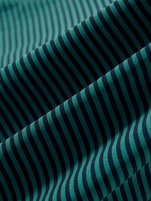 Close-up of turquoise stripe upgraded two-tone striped quick dry polo shirt, showcasing texture and print details.