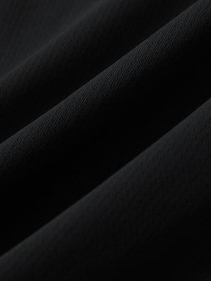 Close-up of soft mesh fabric for black superion softness mesh joggers with zipper pockets