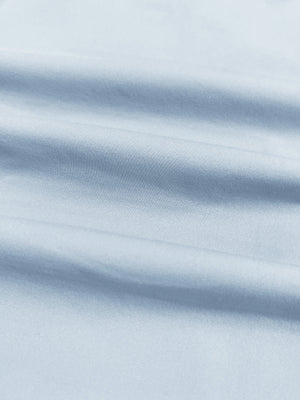 Close-up of lightweight breathable fabric texture, showing fine woven details, lightweight upf50+ short sleeve golf vests jacket in light blue
