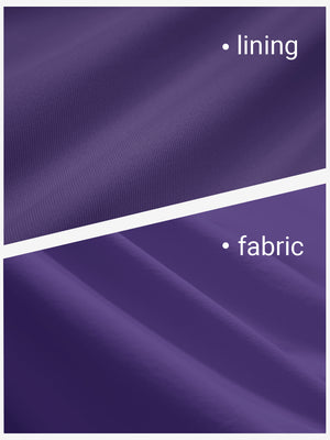 Close-up texture of dark purple women's gym golf shorts with liner pocket fabric showing detailed outer and inner lining material.