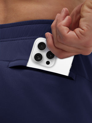 Back view of pocket on navy breathable running shorts with 4 zipper pockets