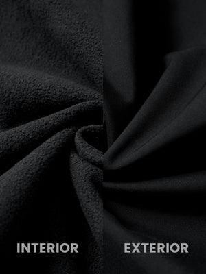 Fabric close-up of reflective hooded softshell jacket, showing texture and finish in black.