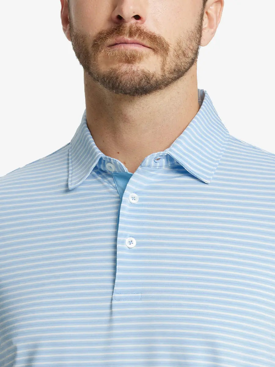 Front close-up shot of model from nose to chest wearing Sport Fit Stripe Polo in Blue Denim Stripe