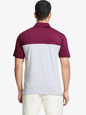 Back half-body view wearing GLACIER GREY Premium Performance Polo