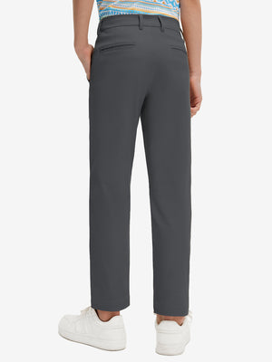 Back lower body view of model wearing the dark grey youth water resistant cotton blend golf pants, highlighting the rear design