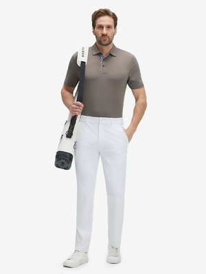 Full-body shot of a model wearing the light brown everyday classic solid polo, showing the complete casual look