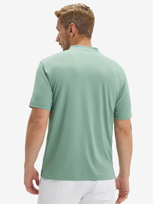 Side-back half-body view of model in grey green moisture-wicking short sleeve henley shirt