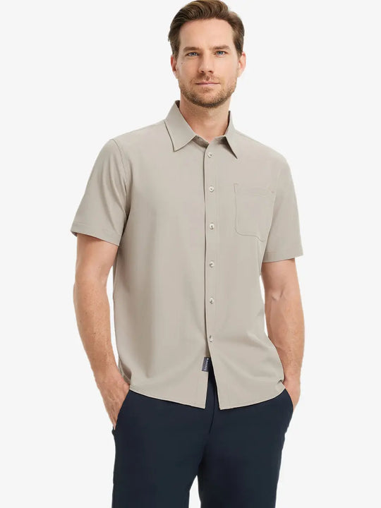 Half-body front view holding a golf club, wearing the DARK KHAKI polo on the course.