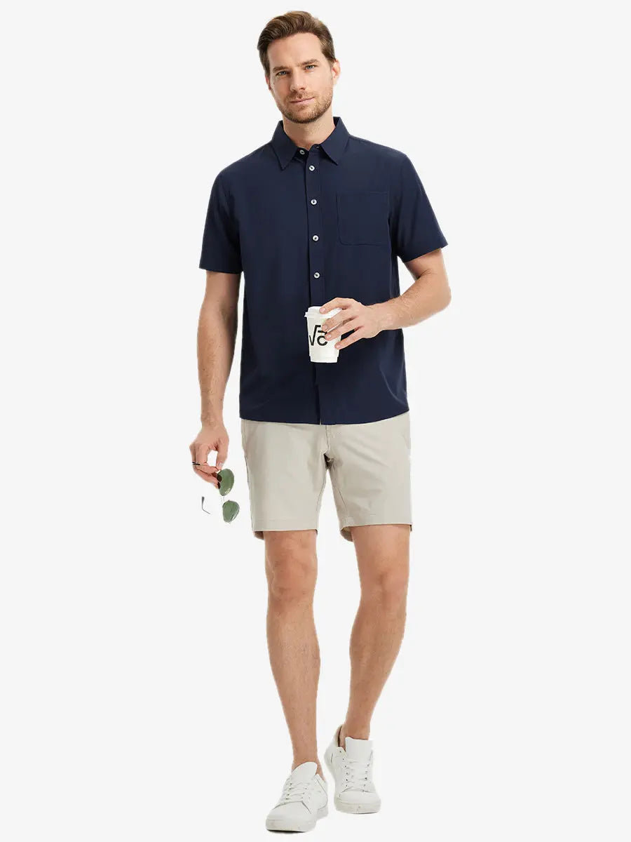 Detail shot with model holding a takeaway drink and sunglasses, featuring the NAVY polo’s side vent.