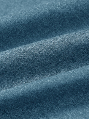 Close-up of colony blue melange moisture wicking quarter zip pullover fabric texture